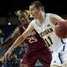 Michigan freshman Nik Stauskasgets past IUPUI senior John Hart in the second half on Monday. Daniel Brenner I AnnArbor.com